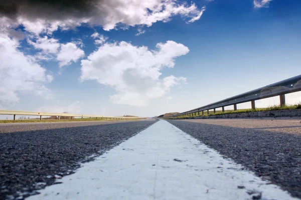 stock image The road and nice blue sky