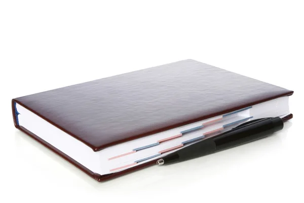 stock image Notebook and pen on a white background