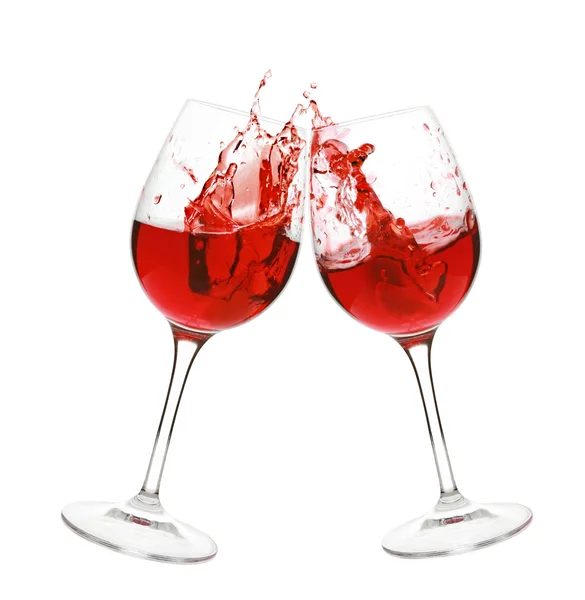 Içinde iki kadeh kırmızı şarap splash — Stok fotoğraf