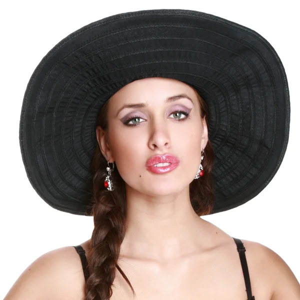 Модная девушка в черной шляпе — стоковое фото