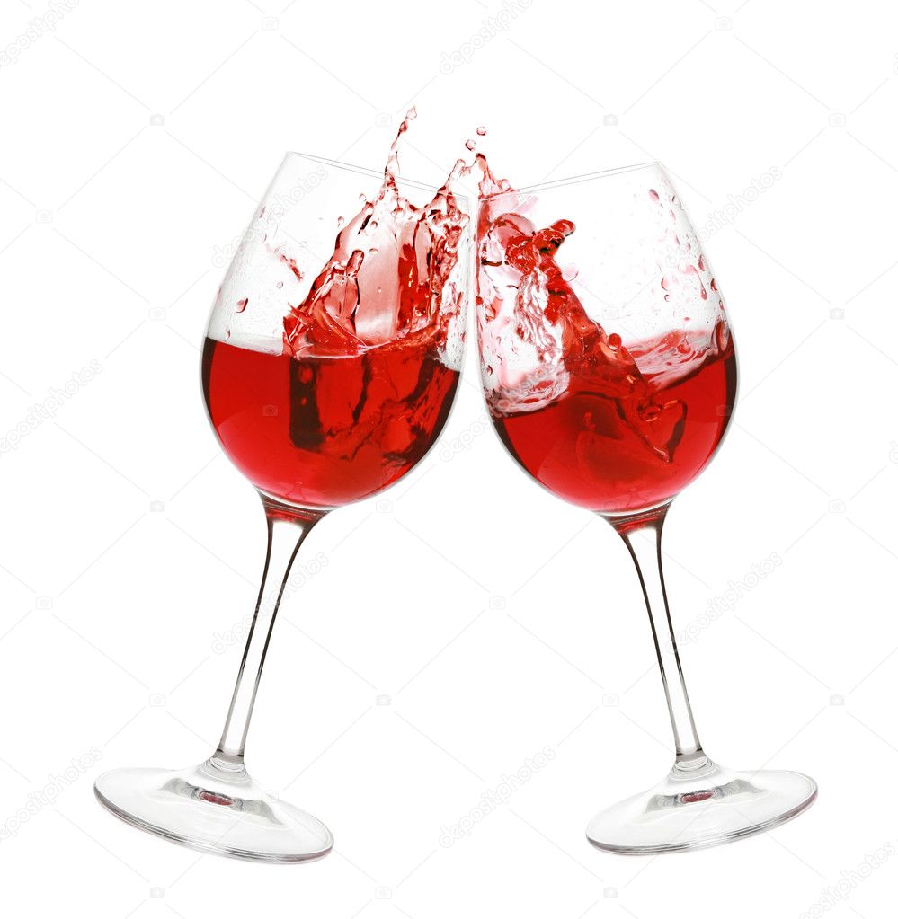 Red wine splash in two glasses