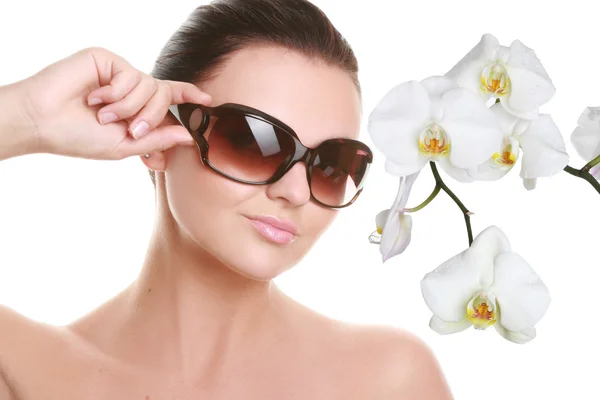 Portrait of a beautiful young woman in sun glasses — Stock Photo, Image