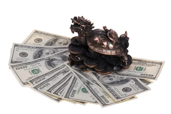 stock image Dragon-turtle on hundred dollar bills