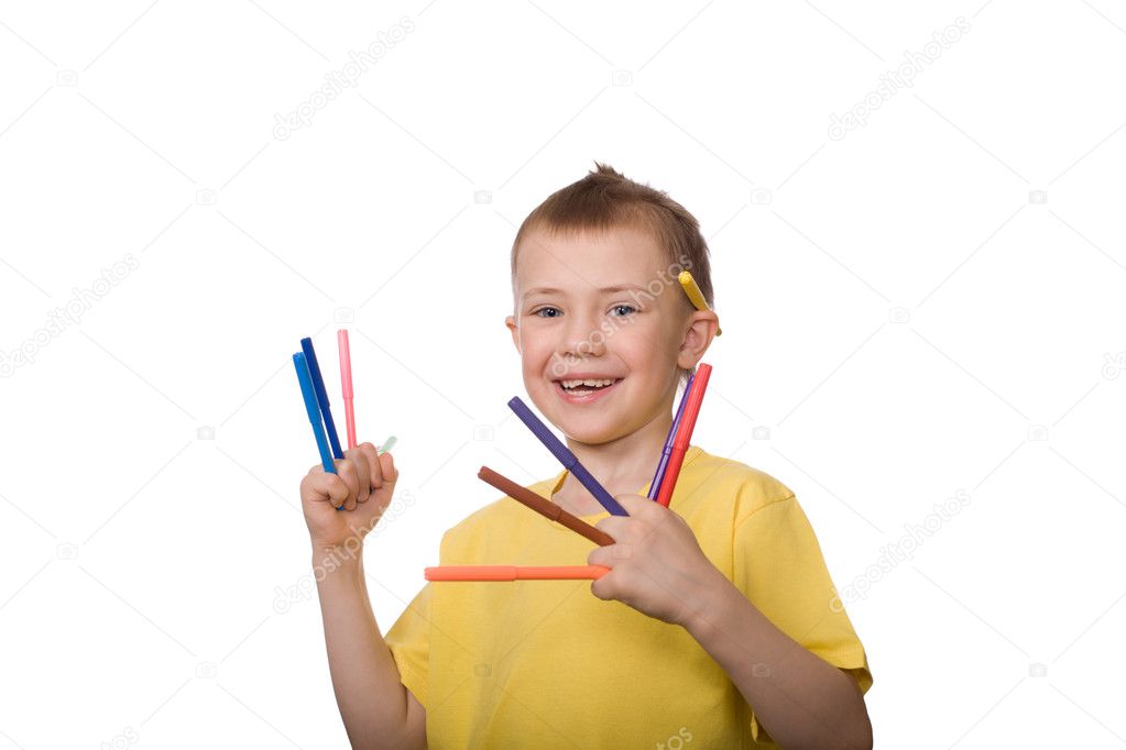 Happy boy holds markers