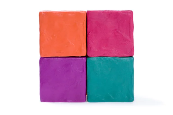 Four cubes of plasticine — Stock Photo, Image