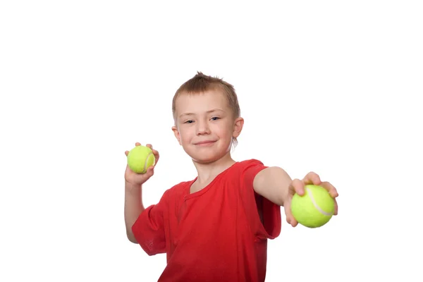 Mały chłopiec z piłki do gry w tenisa — Zdjęcie stockowe
