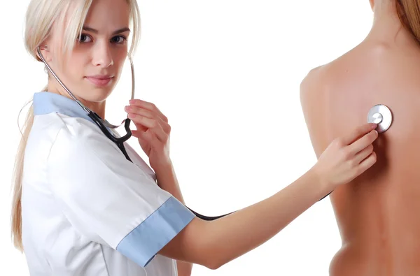 Krankenschwester mit Stethoskop und Patient — Stockfoto