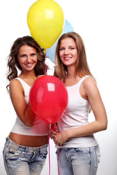 Девушки и воздушные шары — стоковое фото