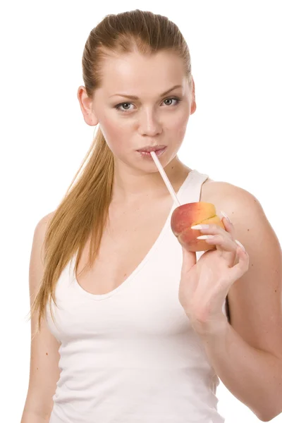 Woman and half of peach — Stock Photo, Image
