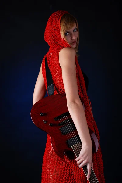 Žena s elektrickou kytarou — Stock fotografie