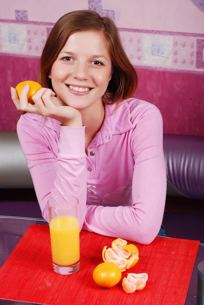 Woman with glass of juice — Stock Photo, Image