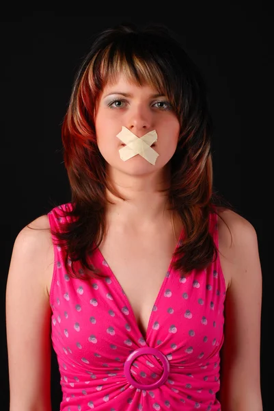 Woman with cross on her mouth — Stock Photo, Image