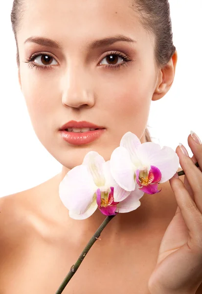 Vrouw en orchid — Stockfoto