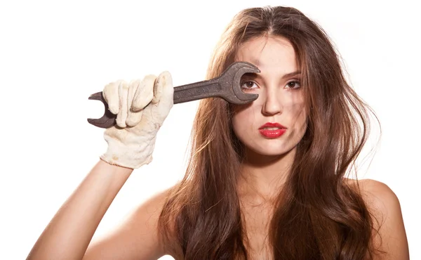 Woman and wrench — Stock Photo, Image