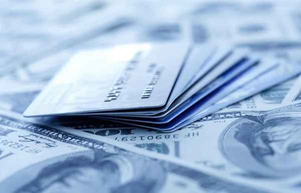 Credit cards on dollars background — Stock Photo, Image