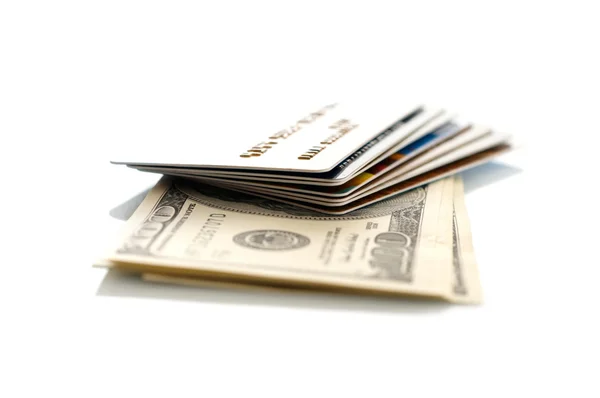 Dólares e cartão de crédito. DOF superficial — Fotografia de Stock