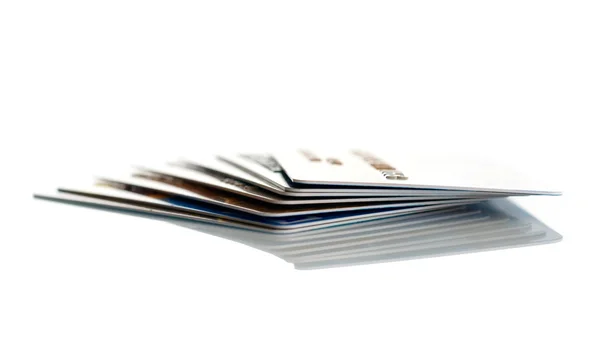 Πιστωτικές κάρτες που απομονώνονται σε λευκό αμουδερές — Φωτογραφία Αρχείου