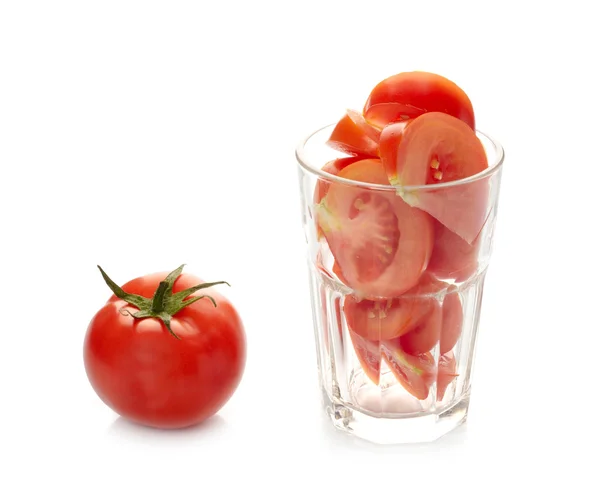 Tomatoes and glass — Stock Photo, Image