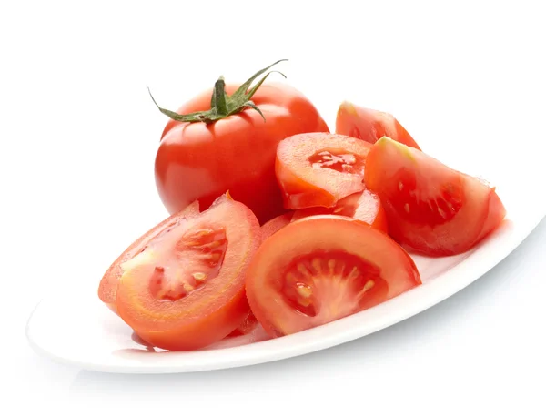 Tomatoes on white plate — Stock Photo, Image