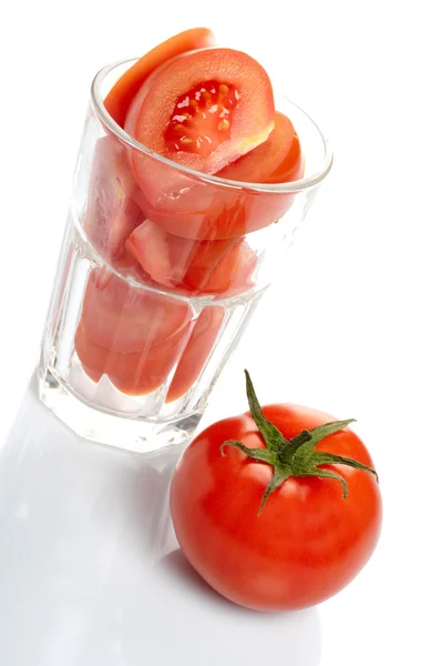 Tomaten und Glas — Stockfoto