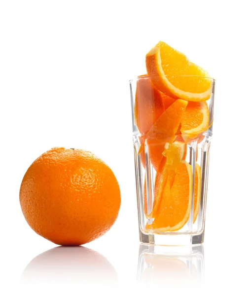 Orangen und Glas — Stockfoto