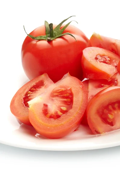 Tomatoes on plate — Stock Photo, Image