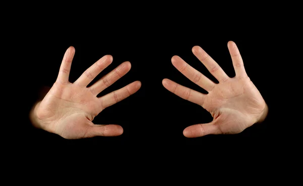 Χέρια που απομονώνονται σε μαύρο φόντο — Φωτογραφία Αρχείου