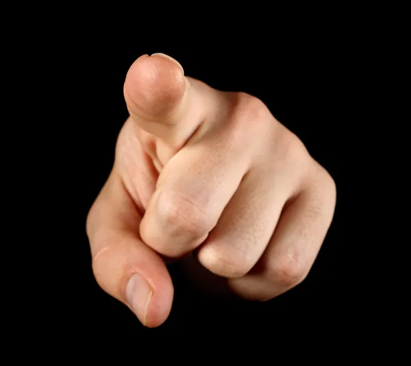 Указательный палец на черном фоне — стоковое фото