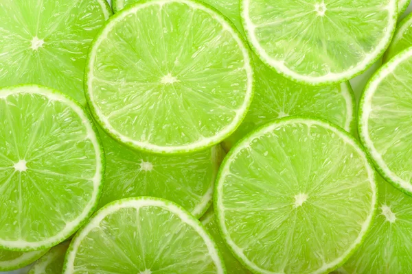 Lime slices background — Stock Photo, Image