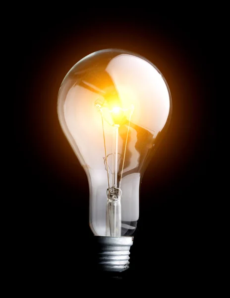 Photo of light bulb on black — Stock Photo, Image