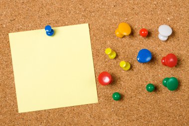 Blank paper note on cork board clipart