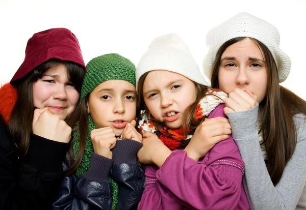Fyra unga flickor i vinter outfit — Stockfoto