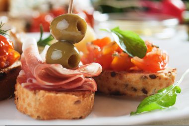 Bruschette with tomato and olives clipart