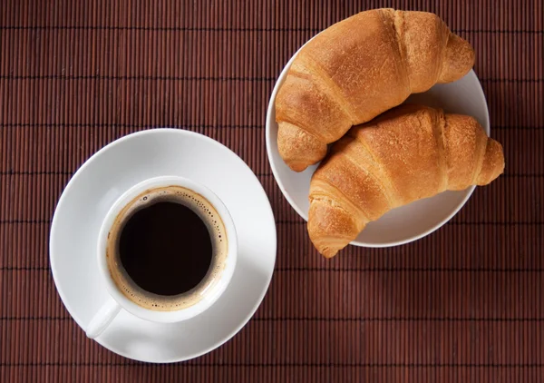 Coffee and croissants — Stock Photo, Image