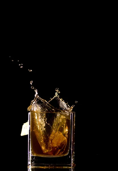 Tea bag splash — Stock Photo, Image