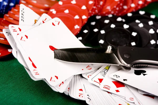 Poker and knife — Stock Photo, Image