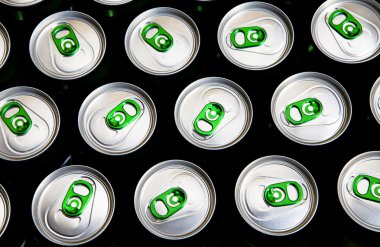 Aluminum cans in drops of water with key clipart