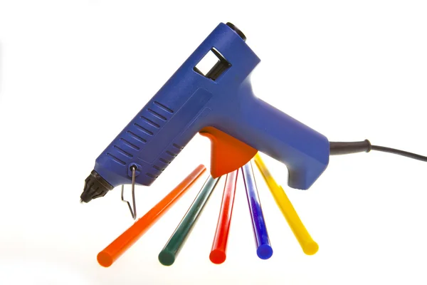 Pistolet à colle et colle multicolore — Photo