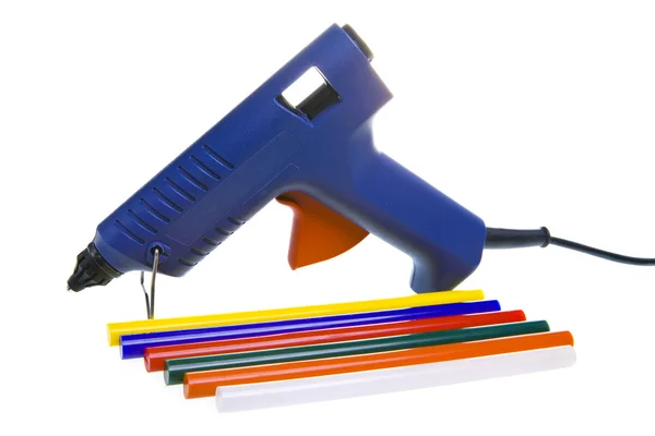 Pistola glutinosa e cola multicolorida — Fotografia de Stock