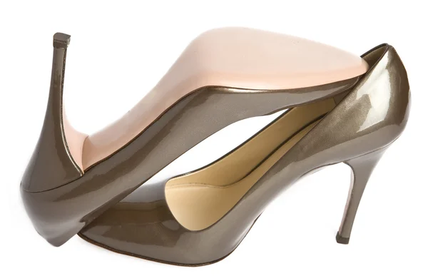 Beige-guld kvinna lackerade nya skor — Stockfoto