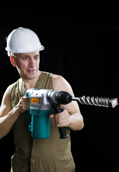 El constructor en un casco protector — Foto de Stock