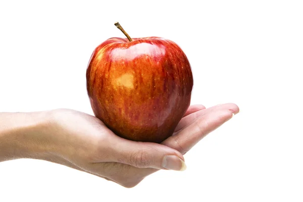 Ręka trzyma jabłko — Zdjęcie stockowe