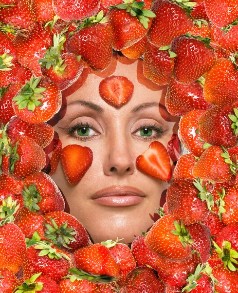 Portrait of young woman, laying under strawberry — Stock Photo, Image
