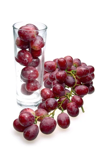 Aglomerado de uvas e vidro — Fotografia de Stock