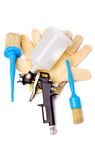 Airbrush, brushes and protective gloves — Stock Photo, Image