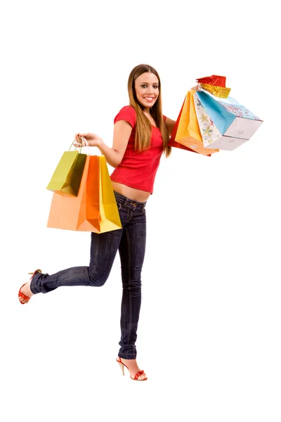 Привлекательная торговая девушка с красочными сумками — стоковое фото