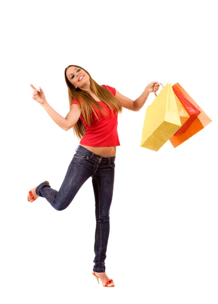 Attraktiv shopping flicka med färgglada väskor — Stockfoto