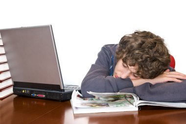 Teenager asleep while studying clipart