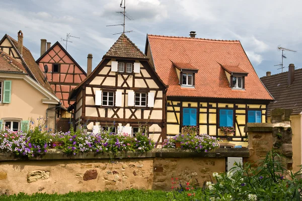 Timbered houses in the village of Eguisheim in Elsace, France — стоковое фото