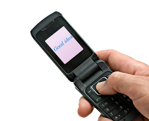 Teléfono móvil con "Buena idea" mostrado en su solapa — Foto de Stock
